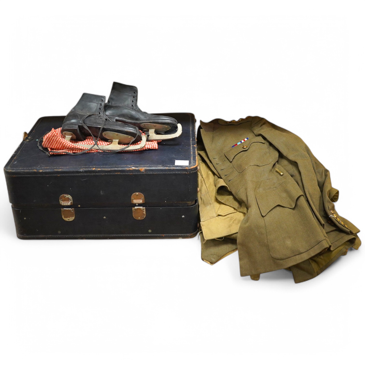 A WWII Welsh Guard’s uniform, comprising a dress jacket, two dress blouses, one with label stating 1940 Pattern Size No.6, breast 38” to 39”, waist 33” to 34”, a pair of breeches, a pair of trousers and a tie, together w
